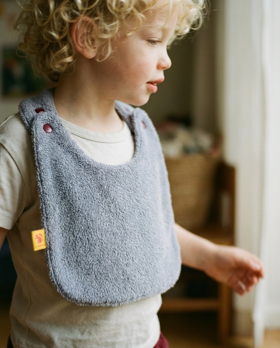 Reversible Bib terry lilac/technical fabric lilac