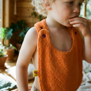 Reversible Bib terry orange/muslin mauve