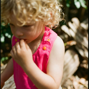 Reversible Bib fuchsia