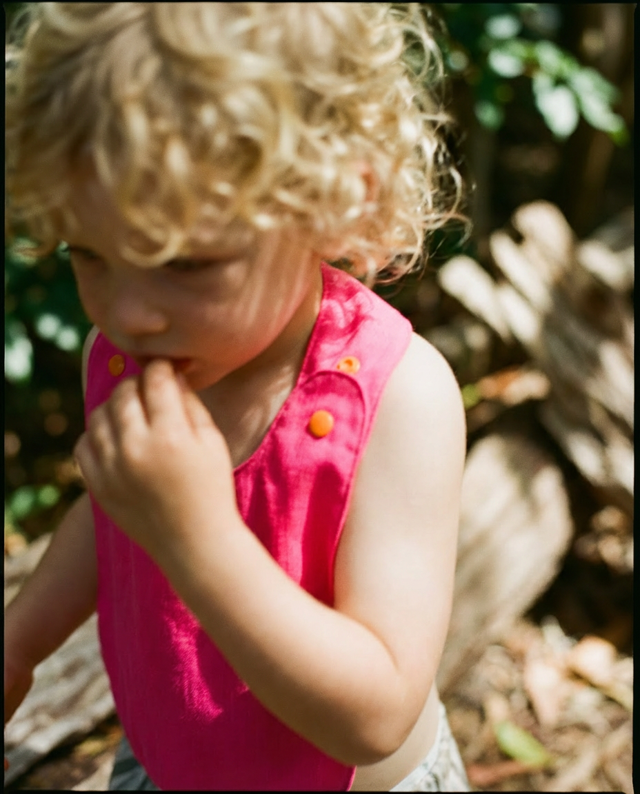 Reversible Bib fuchsia