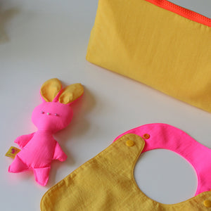 Reversible Bib yellow/fuchsia