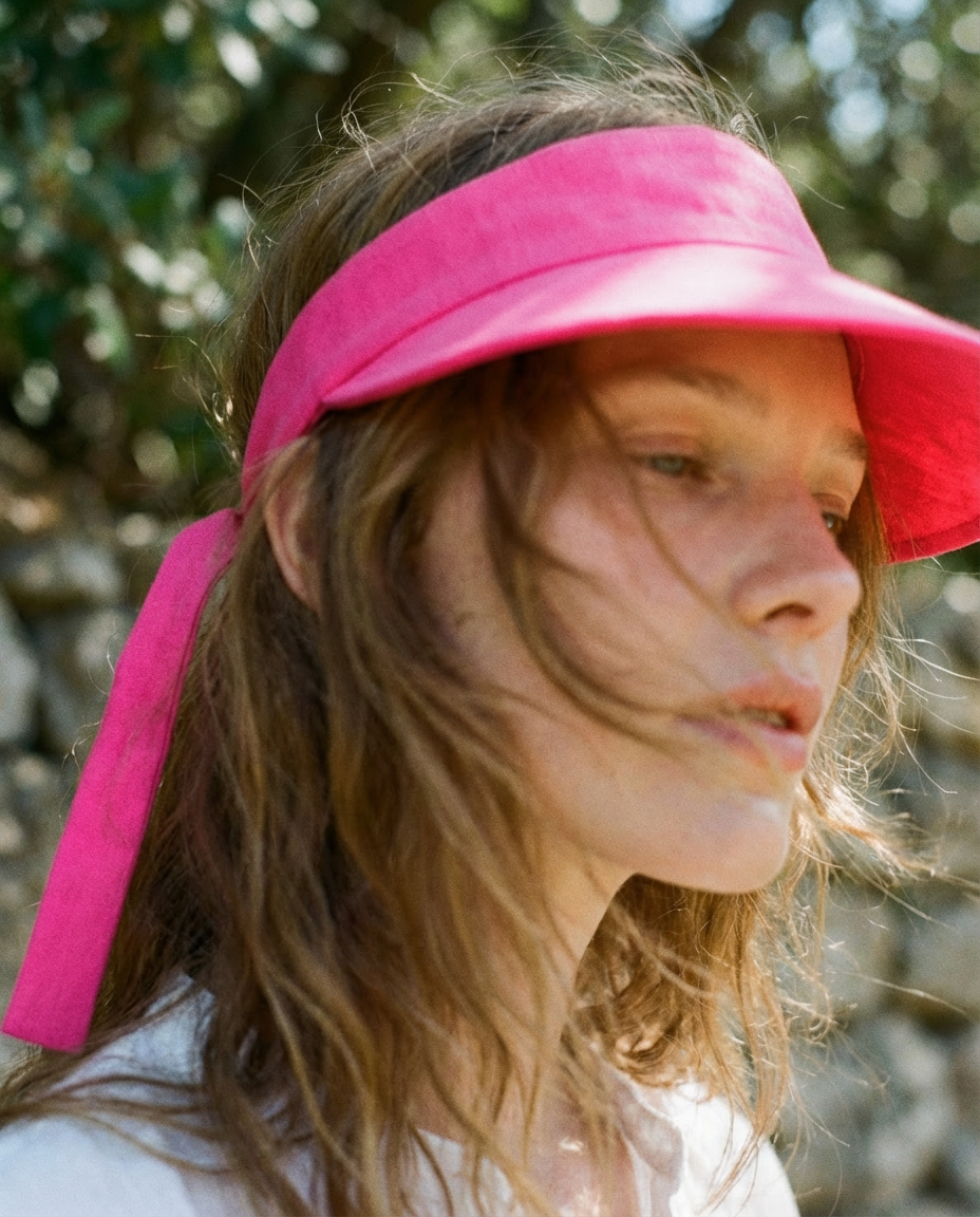 Visera with back bow fuchsia