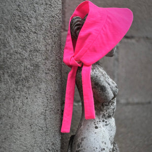 Visera with back bow fuchsia