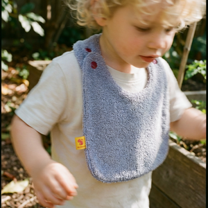 Reversible Bib terry lilac/technical fabric lilac