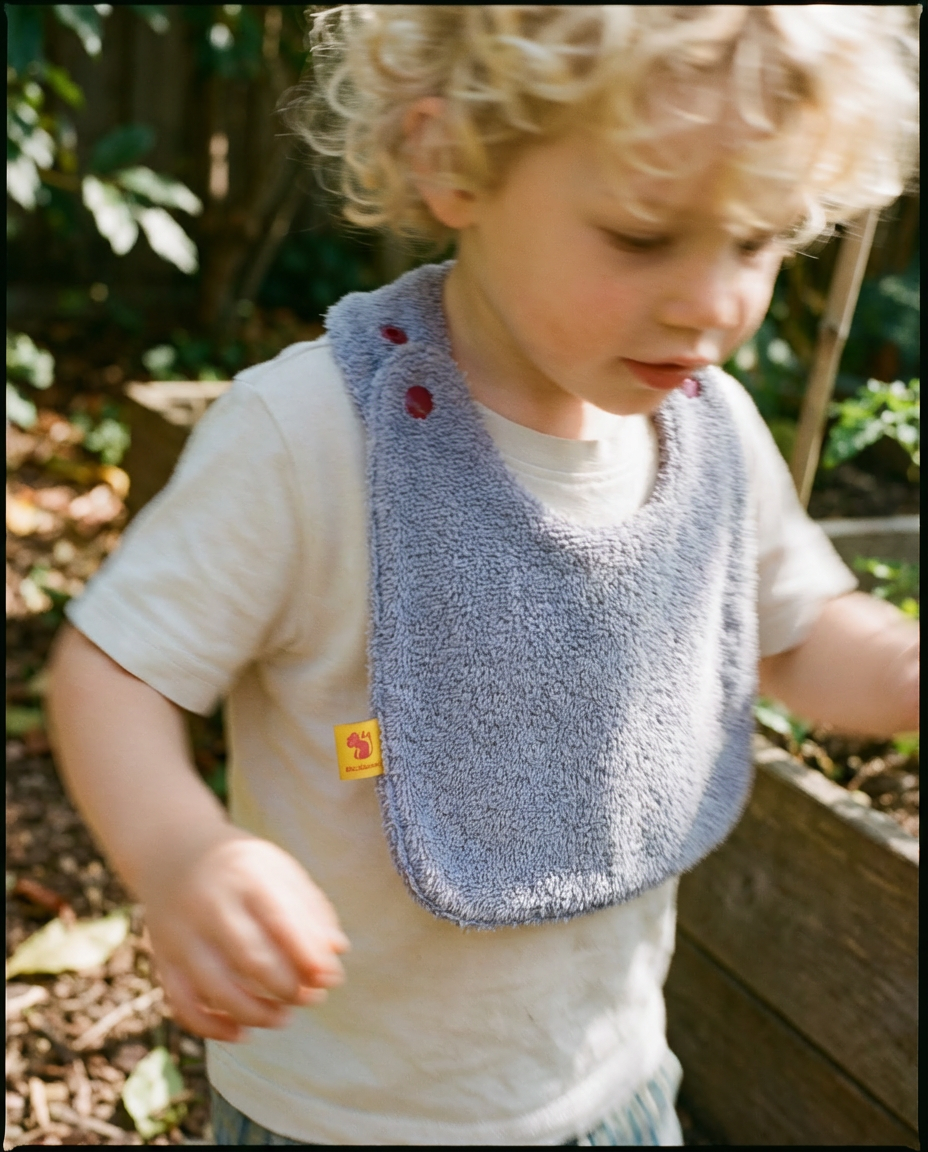 Reversible Bib terry lilac/technical fabric lilac