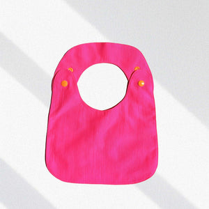Reversible Bib fuchsia