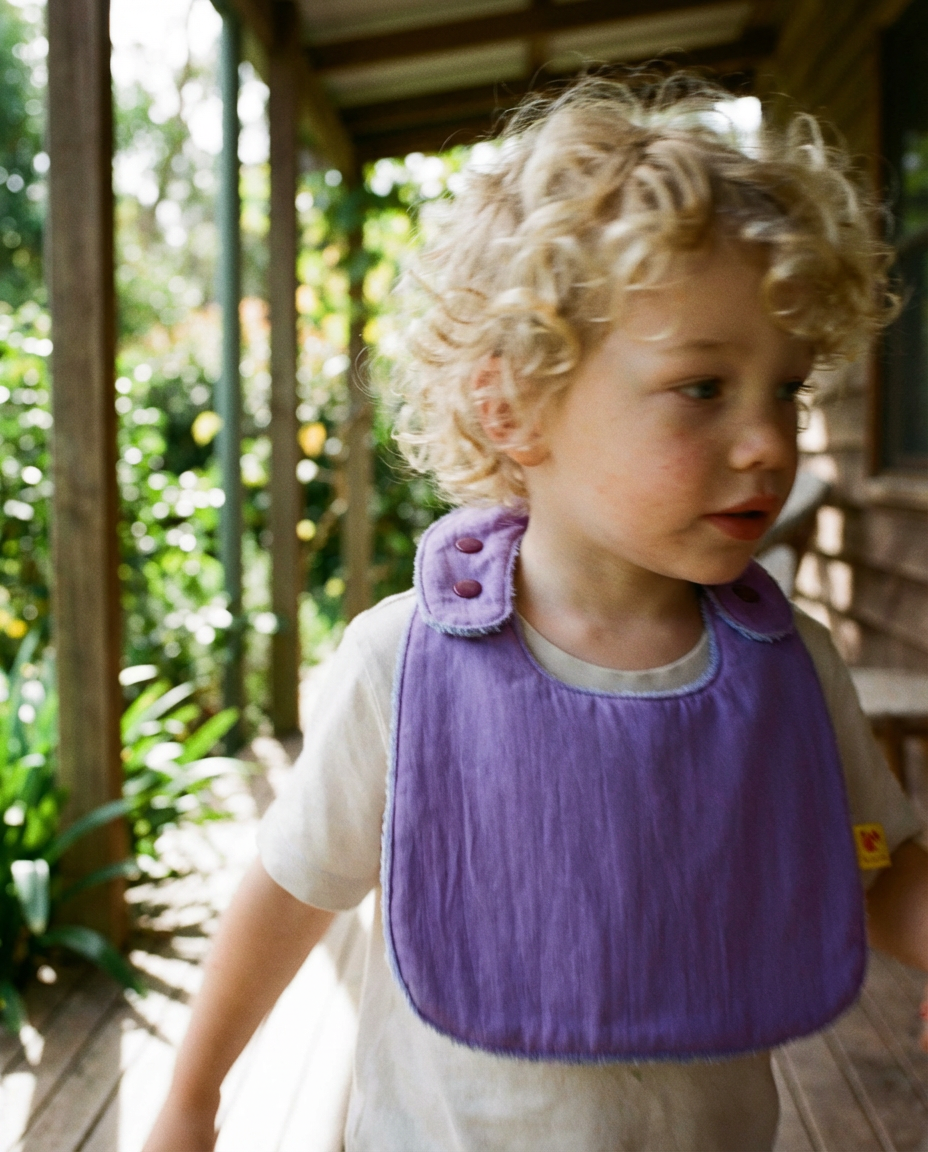 Reversible Bib terry lilac/technical fabric lilac