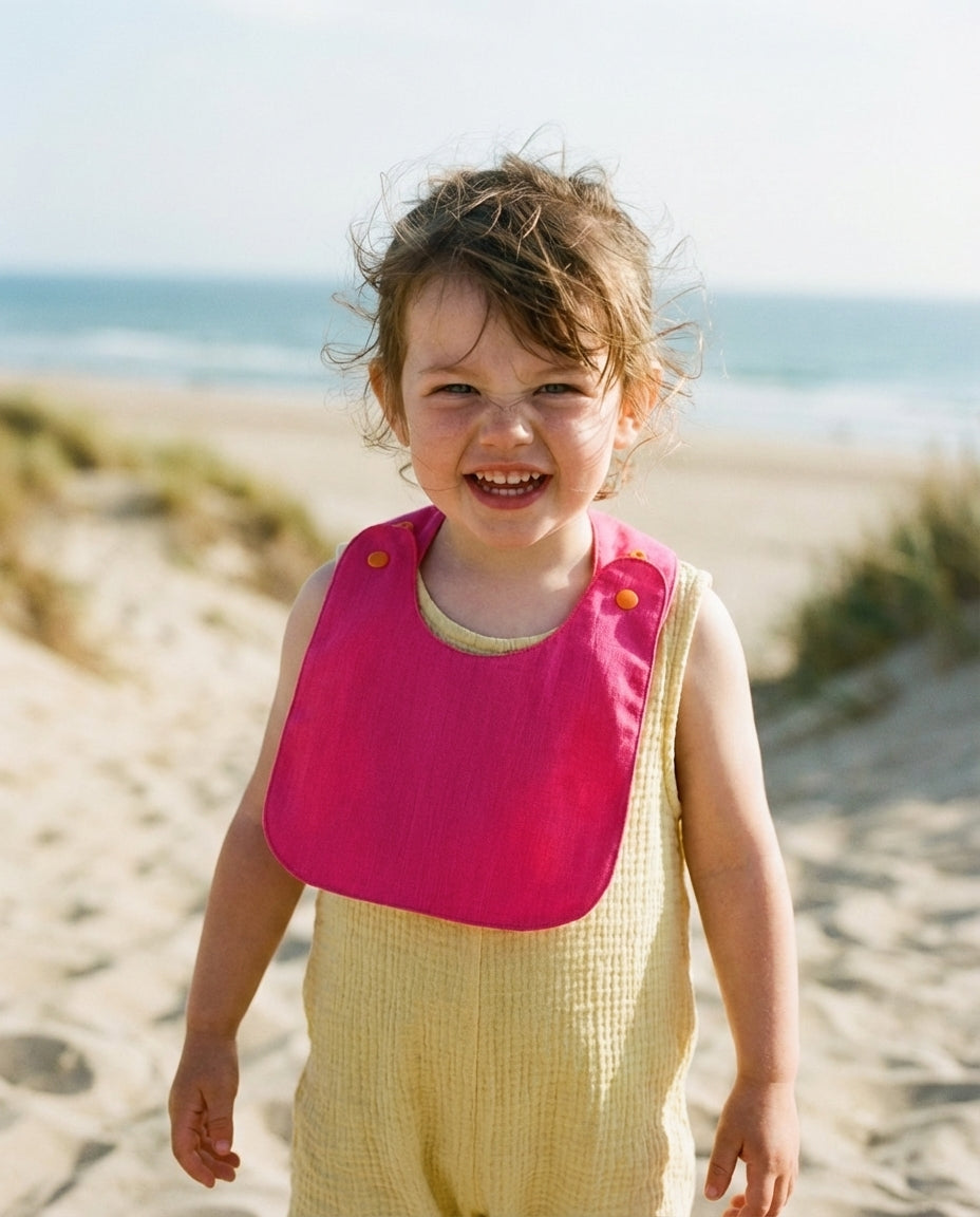 Reversible Bib fuchsia