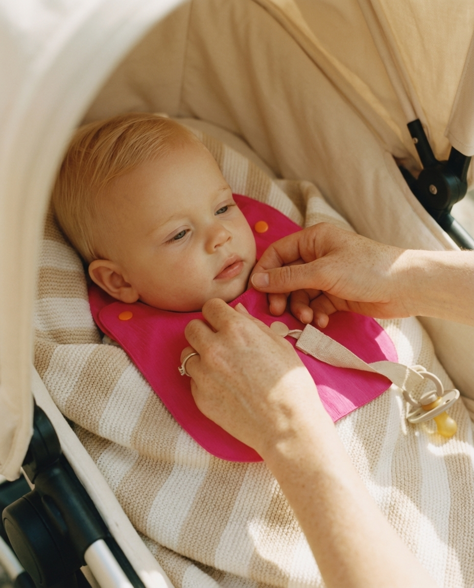 Reversible Bib fuchsia